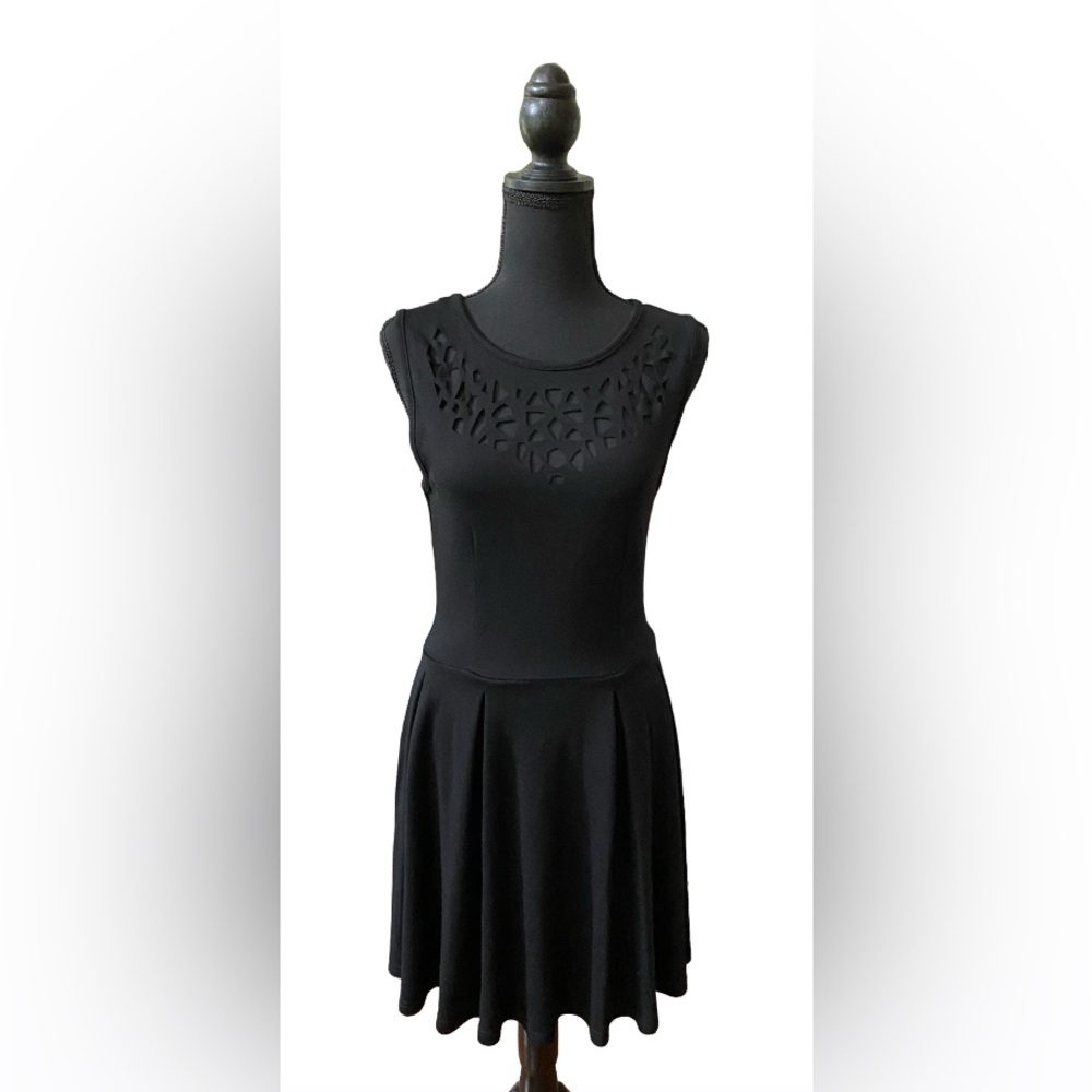 Sans Souci: Black Dress with Cut Out Chest